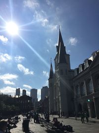 Sun shining through city