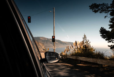 Cars on road against sky