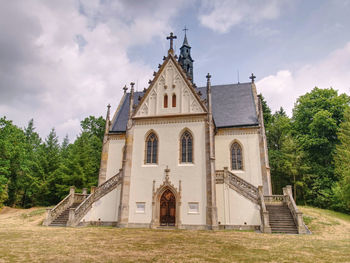 Exterior of historic building against sky