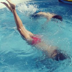 Woman swimming in pool
