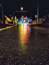 Surface level of illuminated street at night