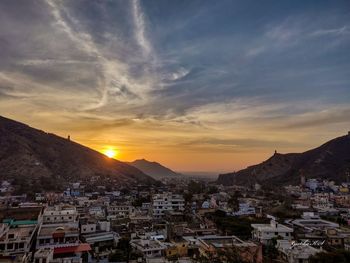 High angle view of townscape against sky during sunset