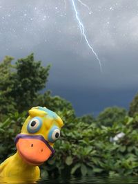 Close-up of a toy against the sky