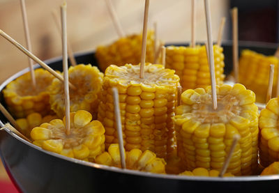 Close-up of corn in bowl on table