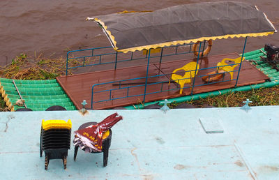 High angle view of man sitting outdoors