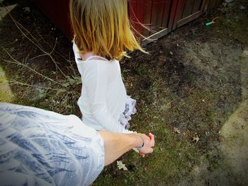 Close-up of woman standing in pond