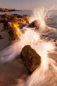 Scenic view of sea during sunset