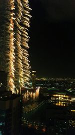 Illuminated cityscape at night