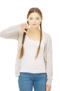 Portrait of a beautiful young woman over white background