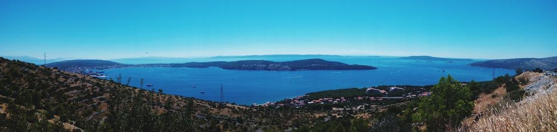 High angle view of bay against clear sky