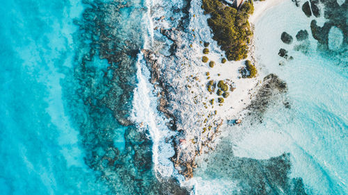 High angle view of swimming pool by sea