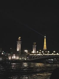 Illuminated buildings at waterfront