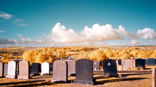 Panoramic view of cemetery against sky