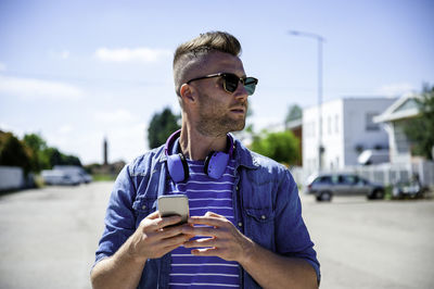 Young man using mobile phone