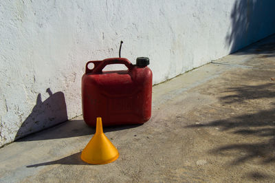 Close-up of fire hydrant against wall