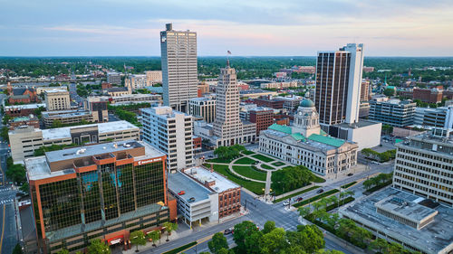 Buildings in city against sky