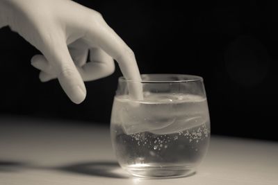 Close-up of drink over white background