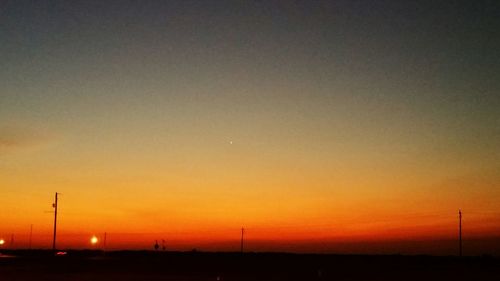 Scenic view of landscape at sunset