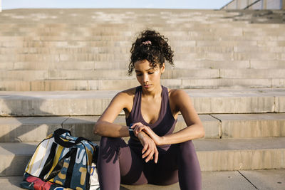 Young woman using mobile phone