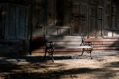 Empty bench in abandoned building