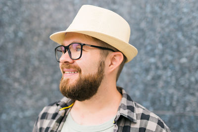 Portrait of man wearing hat