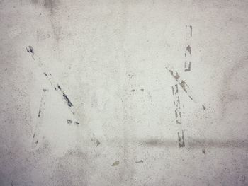 High angle view of footprints on wall