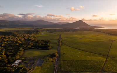 Scenic view of landscape against sky during sunset