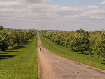 Road passing through field