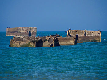 Scenic view of sea against clear sky