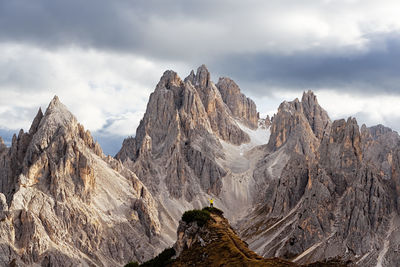 Panoramic view of rocky mountains against sky