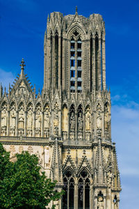 Low angle view of building against blue sky