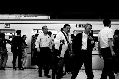 People standing in train