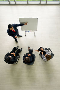 High angle view of people on floor