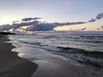 Scenic view of sea against sky during sunset