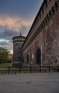 View of historic building against sky during sunset