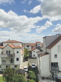 Buildings in city against sky