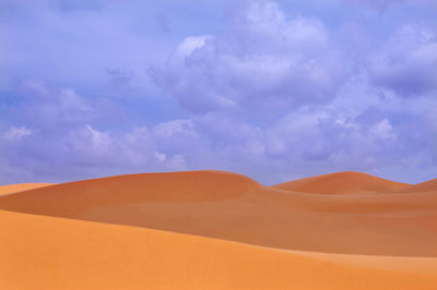 Scenic view of desert against sky