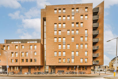 Buildings in city against sky