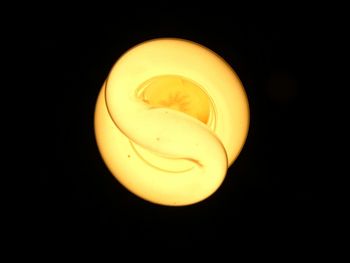 Close-up of illuminated light bulb