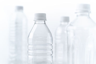 Close-up of glass bottle on table