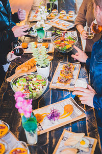 Midsection of woman eating food