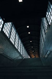 Low angle view of illuminated staircase at railroad station