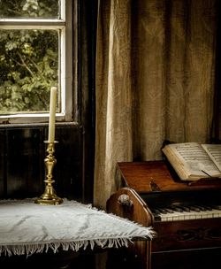 Altar and piano in chapel. 