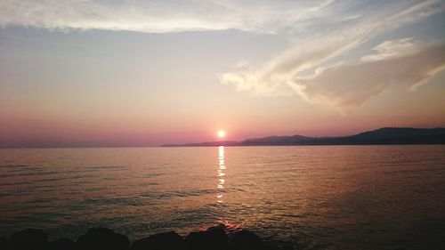 Scenic view of sunset over river