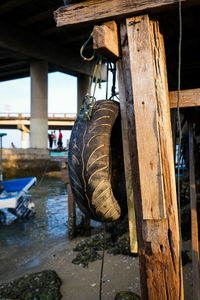 Close-up of wooden post in river