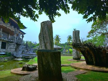 Old ruins by building against sky