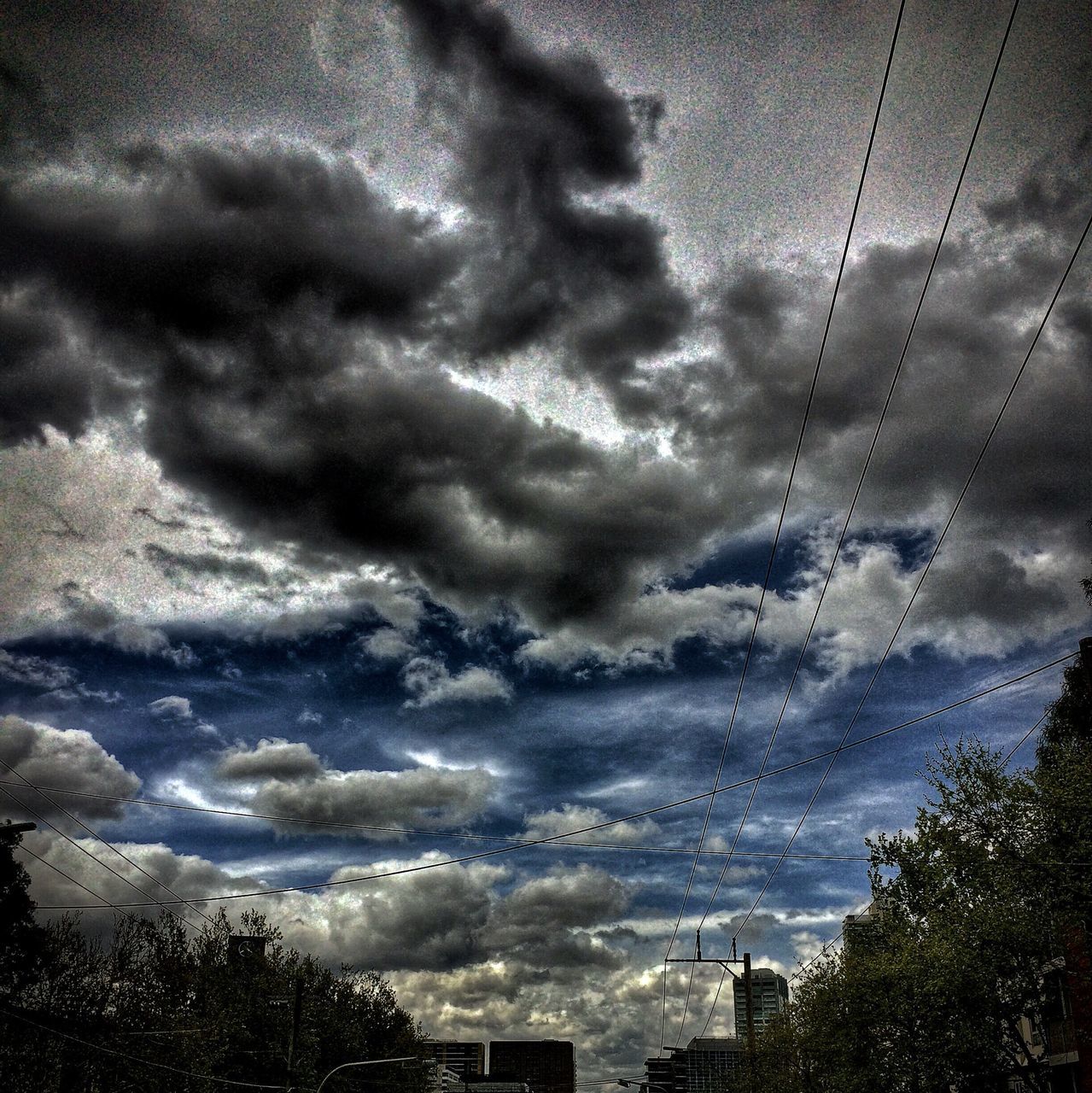 cloud - sky, sky, weather, cloudy, tree, beauty in nature, overcast, storm cloud, nature, scenics, low angle view, dusk, tranquility, dramatic sky, cloud, tranquil scene, silhouette, atmospheric mood, outdoors, no people