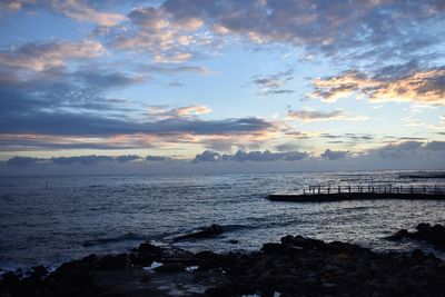 Scenic view of sea against sky during sunset