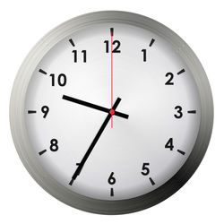 Close-up of clock over white background
