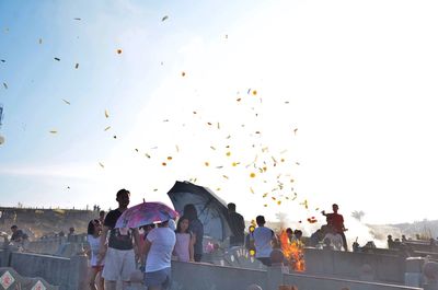 People on walkway at qingming festival